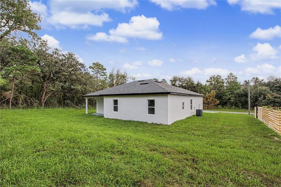 Exterior details and patio area of a home in , Ocala (Image 32).