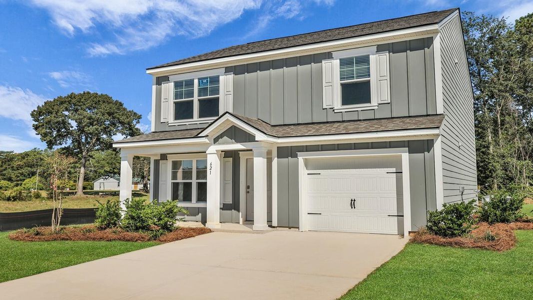 Front exterior of a new home in Center Pointe, Santee, SC, highlighting curb appeal (Image 18). Front exterior of a new home in Center Pointe, Santee, SC, highlighting curb appeal (Image 18).