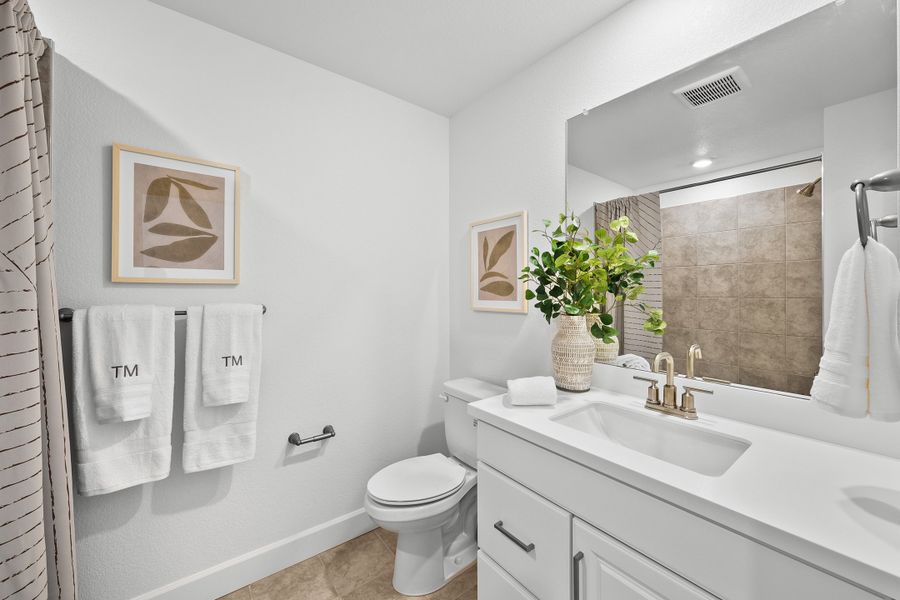 Furnished interior view inside a new home in Trailstone, Arvada (Image 15).