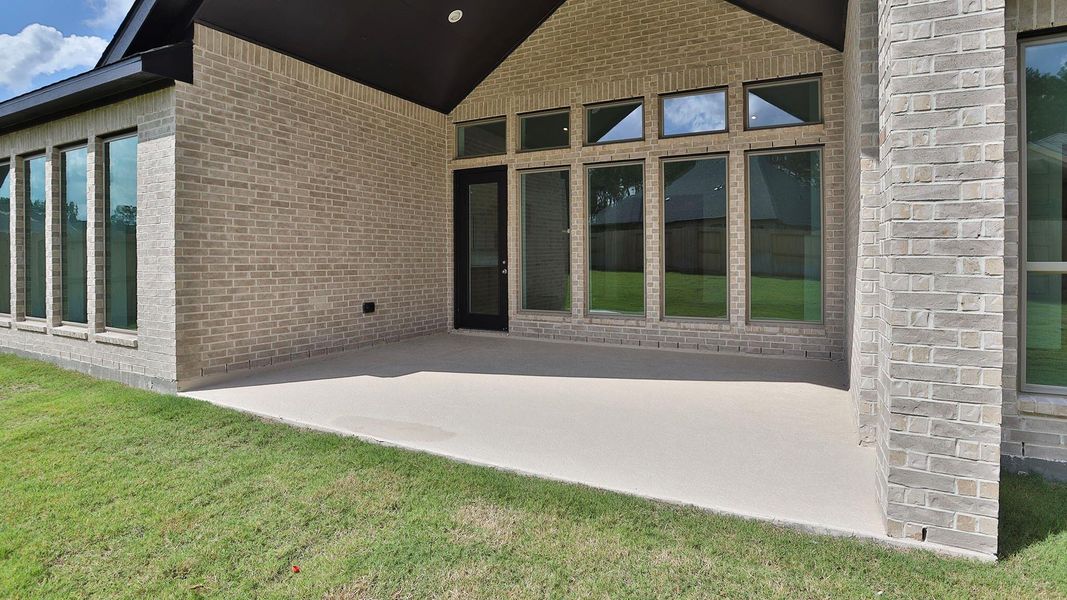 Exterior details and patio area of a home in The Highlands, Porter (Image 3).