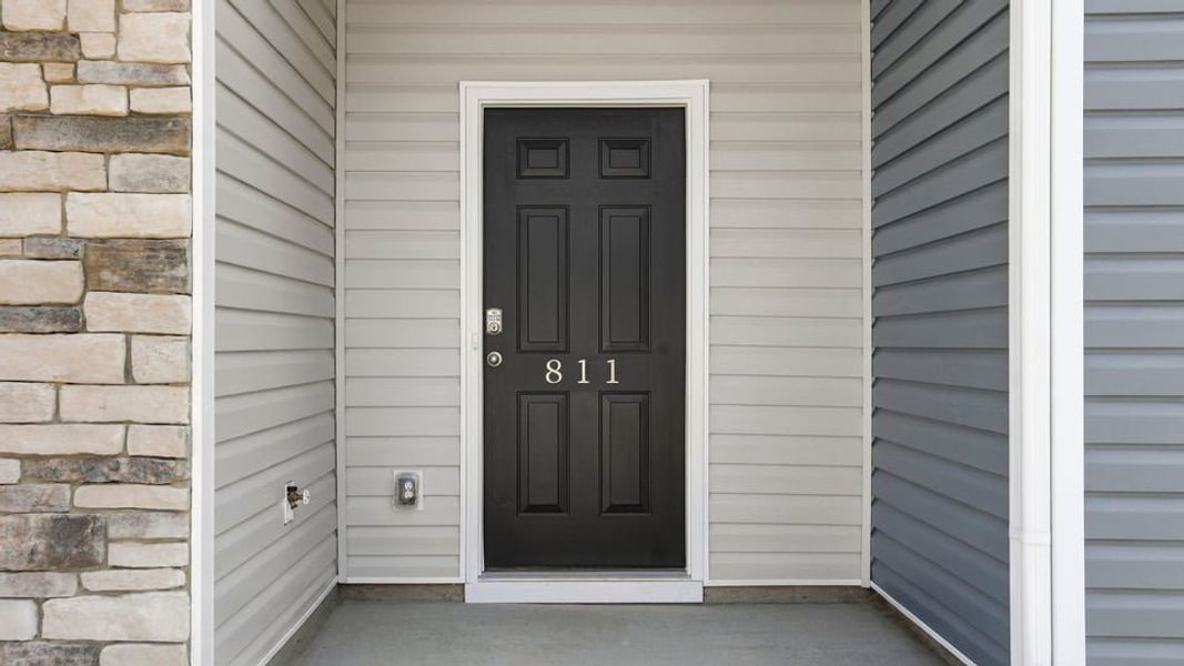 Exterior details and patio area of a home in Covington Village, Greer (Image 3). Exterior details and patio area of a home in Covington Village, Greer (Image 3).
