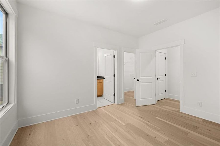 Spacious, unfurnished interior of a new home in Soleil Belmont Park, Canton (Image 44).