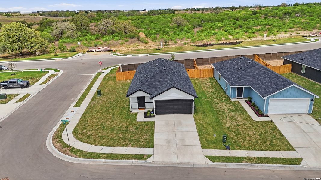 Front exterior of a new home in Ladera, Luling, TX, highlighting curb appeal (Image 25).