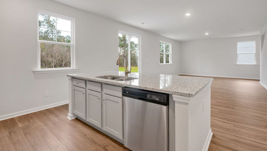 Representative furnished interior of a home built from the GLYNN by D.R. Horton in Grayson Park, Leland (Image 8).