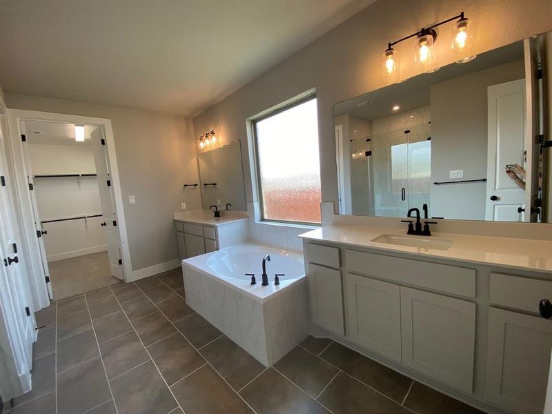 Separate vanities, garden tub