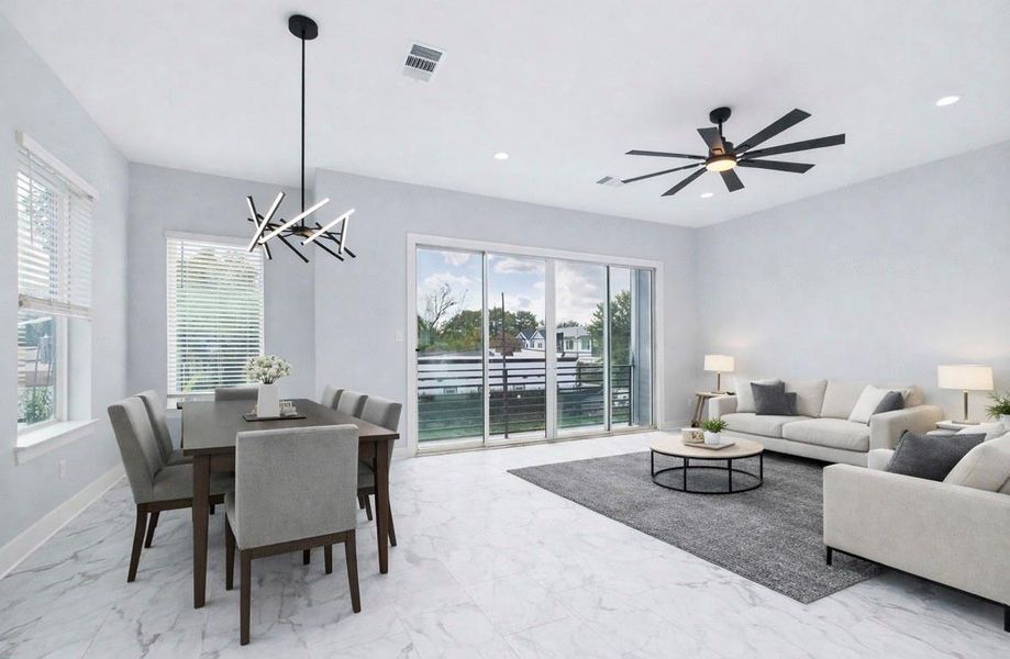 Virtually staged dining/living area Virtually staged dining/living area