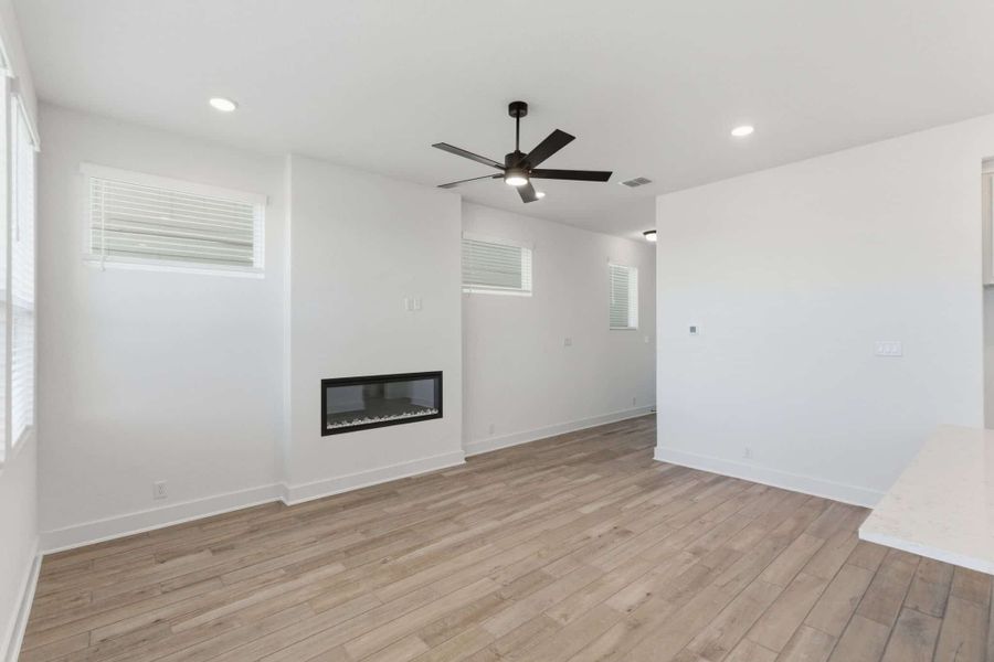 Spacious, unfurnished interior of a new home in Centero at Stone Oak, San Antonio (Image 18).