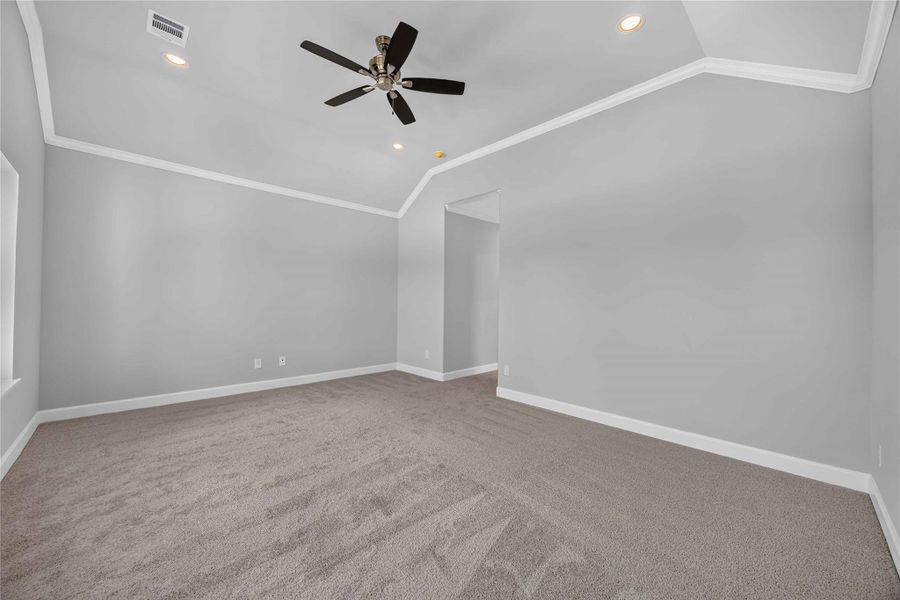 Primary Bedroom Serenity – This alternate view highlights the spacious layout and natural light that make this primary suite the perfect place to relax and recharge.