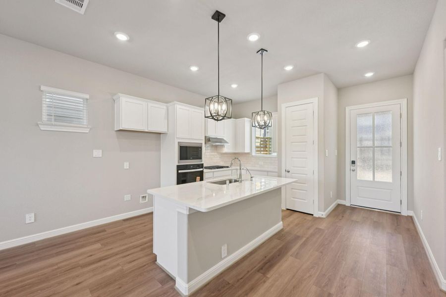 Furnished interior view inside a new home in Kemah Crossing - Luxe Series, Kemah (Image 11). Furnished interior view inside a new home in Kemah Crossing - Luxe Series, Kemah (Image 11).