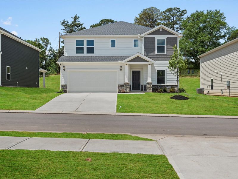 Representative exterior photo of a completed home built from the Johnson by Meritage Homes in Cedar Shoals - Signature Collection, Piedmont, SC (Image 1).