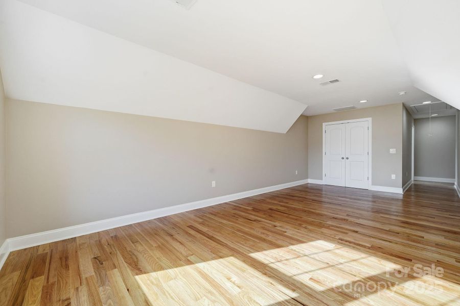 Large upper-level bonus room — perfect as a media room, gym, or additional living space. Large upper-level bonus room — perfect as a media room, gym, or additional living space.