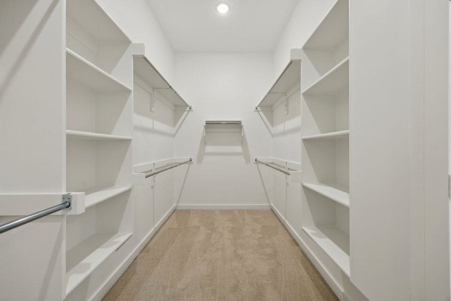 Primary Closet in the Monet II home plan by Trophy Signature Homes – REPRESENTATIVE PHOTO Primary Closet in the Monet II home plan by Trophy Signature Homes – REPRESENTATIVE PHOTO