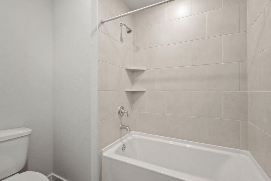 Furnished interior view inside a new home in The Woodlands Hills, Willis (Image 4). Furnished interior view inside a new home in The Woodlands Hills, Willis (Image 4).