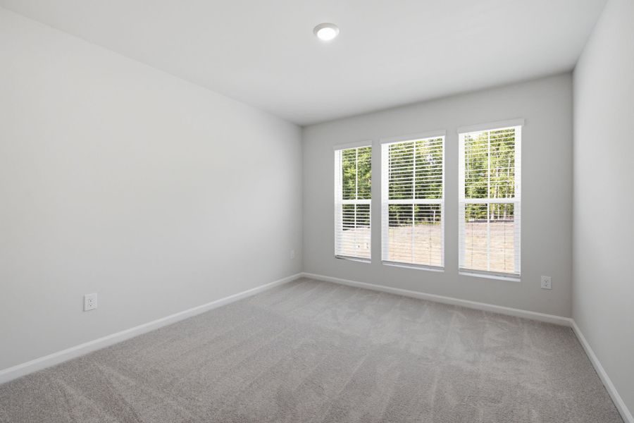 Spacious, unfurnished interior of a new home in Carpenter Falls, Durham (Image 20).