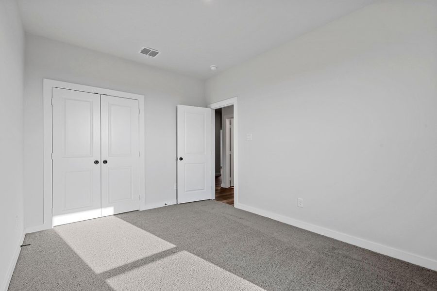 Representative unfurnished interior of a home built from the Garrison II by Cheldan Homes in Arbor Oaks, Boyd (Image 44).