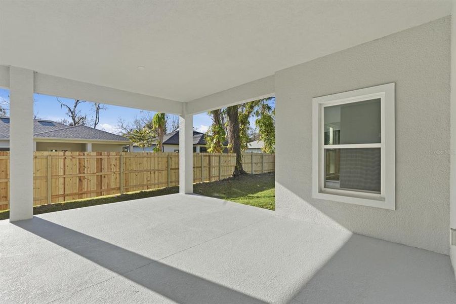 Exterior details and patio area of a home in , New Smyrna Beach (Image 28).