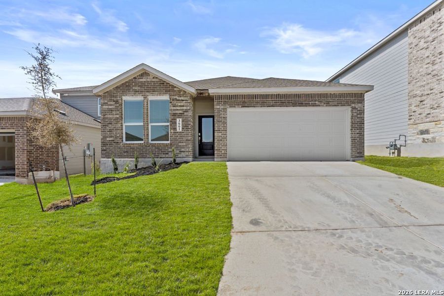 Front exterior of a new home in Brookmill, San Antonio, TX, highlighting curb appeal (Image 1). Front exterior of a new home in Brookmill, San Antonio, TX, highlighting curb appeal (Image 1).