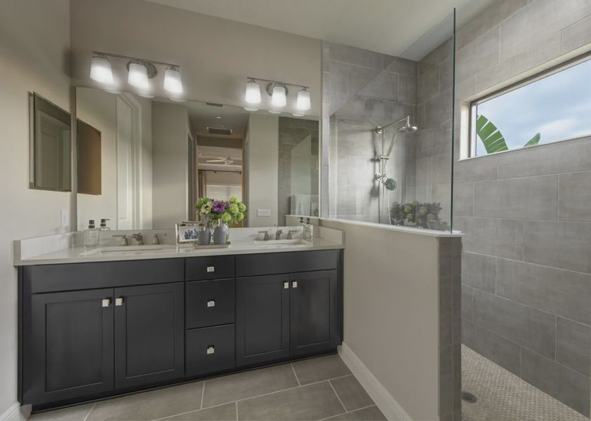 Representative furnished interior of a home built from the Lighthouse by Neal Communities in SkySail, Naples (Image 4).
