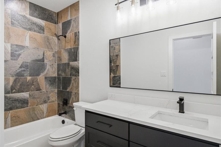 Porcelain tile, large vanity, and more!