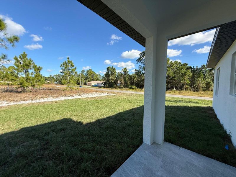 Exterior details and patio area of a home in , Lehigh Acres (Image 16). Exterior details and patio area of a home in , Lehigh Acres (Image 16).
