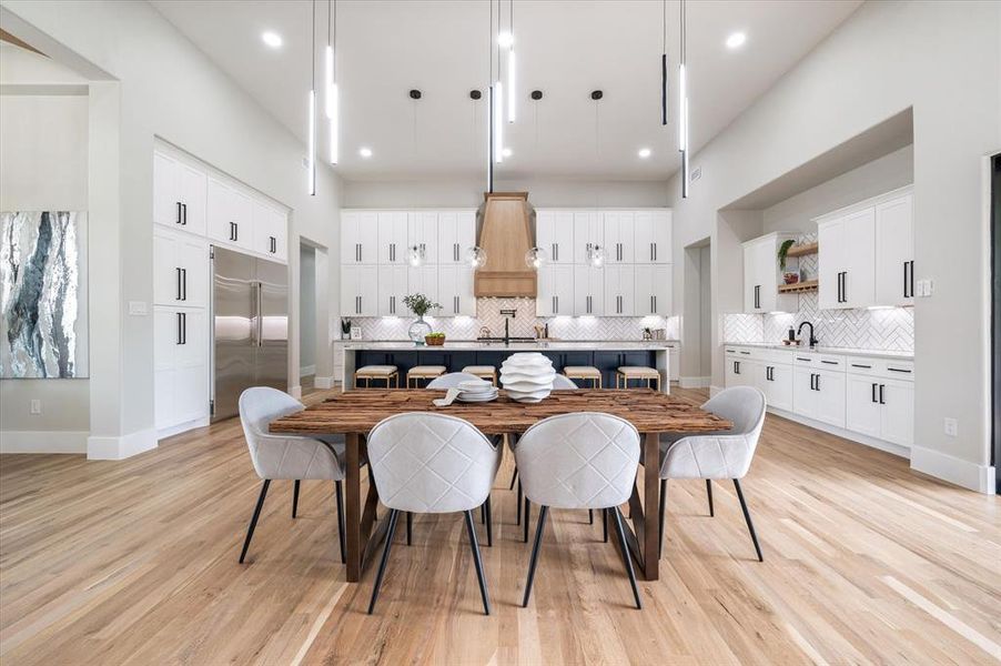 Dining area featuring light hardwood / wood-style flooring and sink