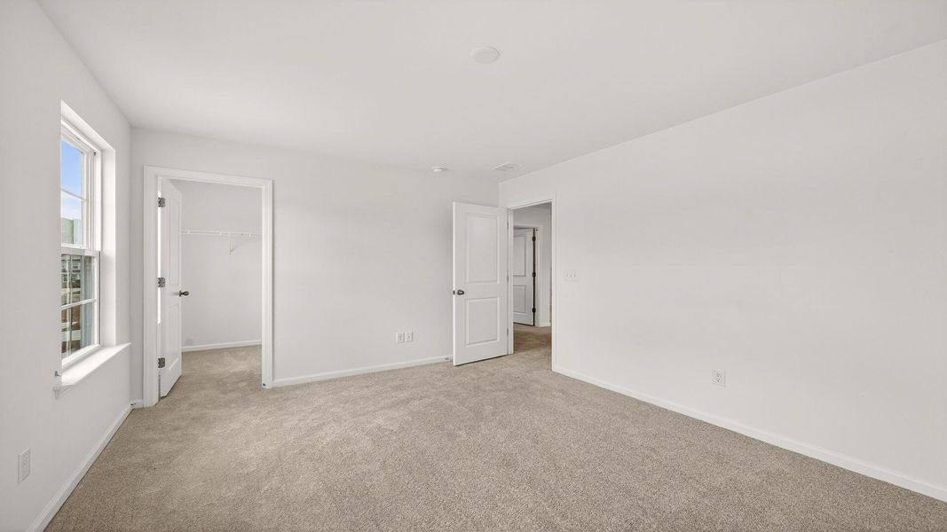 Spacious, unfurnished interior of a new home in Creekside at Andrews, Summerville (Image 22).