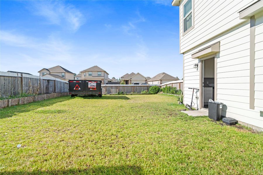Front exterior of a new home in , Huntsville, TX, highlighting curb appeal (Image 21).