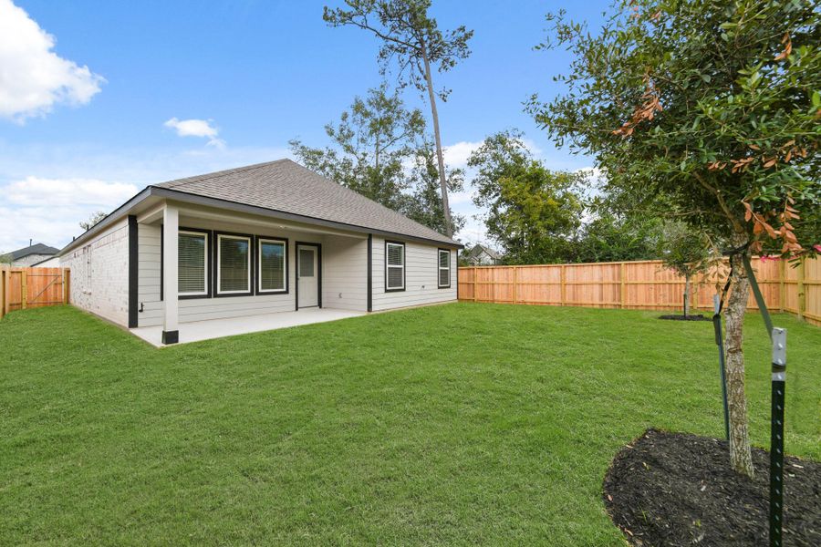 Front exterior of a new home in Barton Creek Ranch, Conroe, TX, highlighting curb appeal (Image 15). Front exterior of a new home in Barton Creek Ranch, Conroe, TX, highlighting curb appeal (Image 15).