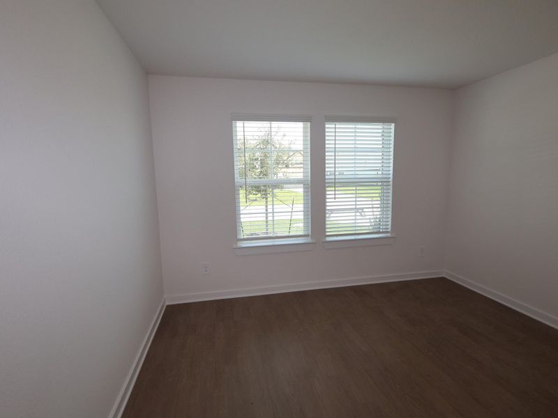 Spacious, unfurnished interior of a new home in Pinewood at Grand Texas, New Caney (Image 7).