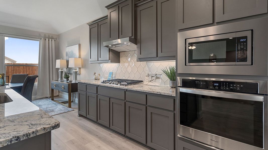 Representative furnished interior of a home built from the Guadalupe by D.R. Horton in Eden Ranch, Arlington (Image 10).