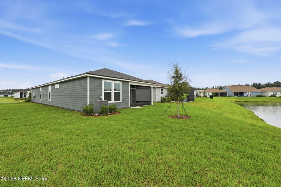 Exterior details and patio area of a home in Del Webb Wildlight, Yulee (Image 3).