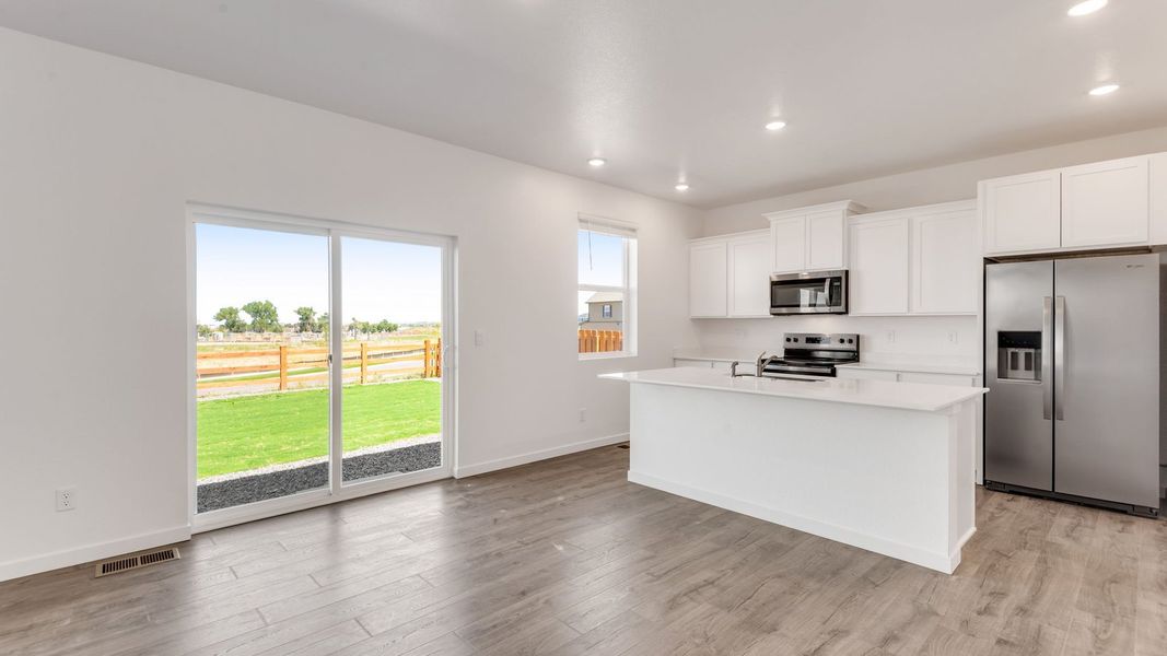 Furnished interior view inside a new home in Settlers Crossing, Commerce City (Image 5).