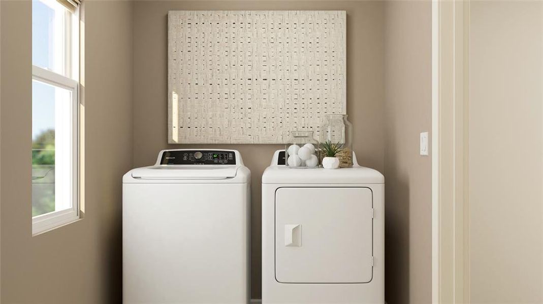 Laundry area with independent washer and dryer and plenty of natural light Laundry area with independent washer and dryer and plenty of natural light