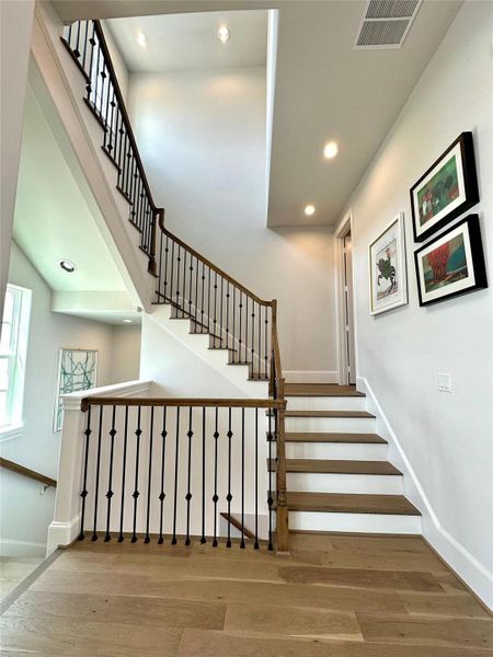 The grand open staircase is a work of art.