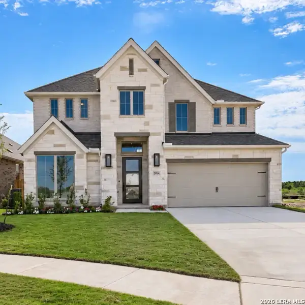 Front exterior of a new home in Mayfair, New Braunfels, TX, highlighting curb appeal (Image 25). Front exterior of a new home in Mayfair, New Braunfels, TX, highlighting curb appeal (Image 25).