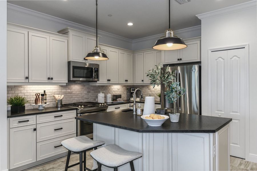 Representative furnished interior of a home built from the Tidewater 2B by Neal Communities in Vicenza, Venice (Image 16).