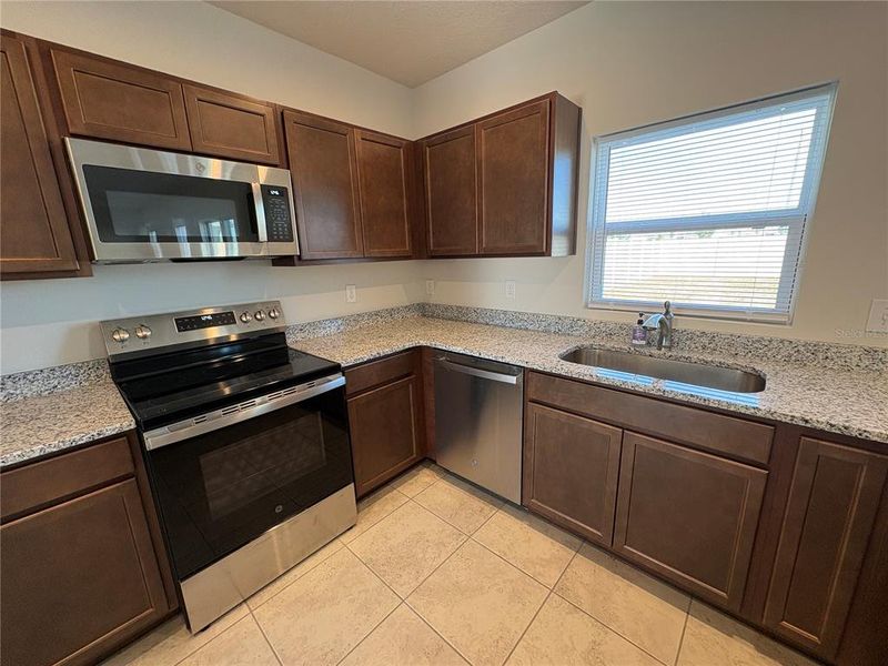 Furnished interior view inside a new home in , Haines City (Image 31).