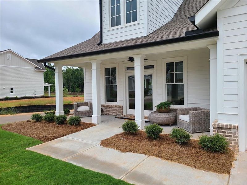 Front exterior of a new home in , Statham, GA, highlighting curb appeal (Image 16). Front exterior of a new home in , Statham, GA, highlighting curb appeal (Image 16).