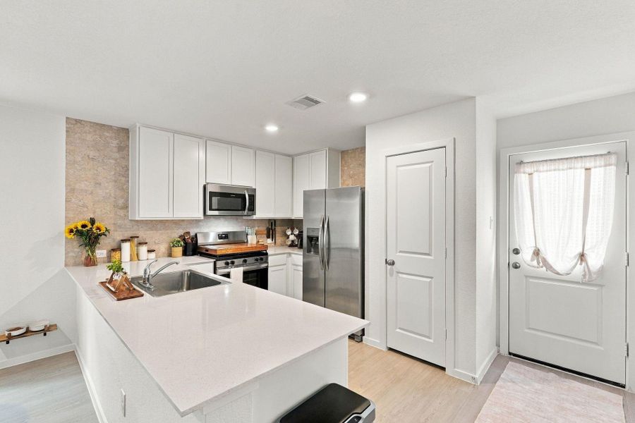 Furnished interior view inside a new home in Caney Mills, Conroe (Image 18).