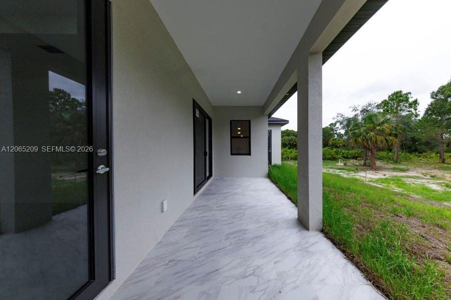 Exterior details and patio area of a home in , Lehigh Acres (Image 39).