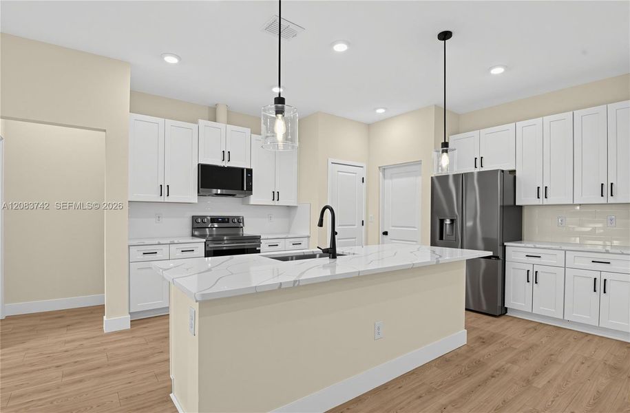 Furnished interior view inside a new home in , Palm Coast (Image 12). Furnished interior view inside a new home in , Palm Coast (Image 12).
