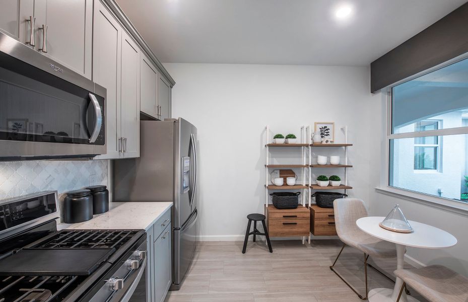 Representative furnished interior of a home built from the Cascadia by DiVosta in BeachWalk by Manasota Key, Englewood (Image 34).
