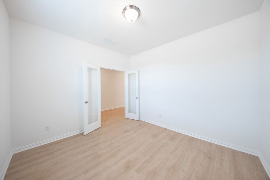 Spacious, unfurnished interior of a new home in Verandah, Royse City (Image 25).