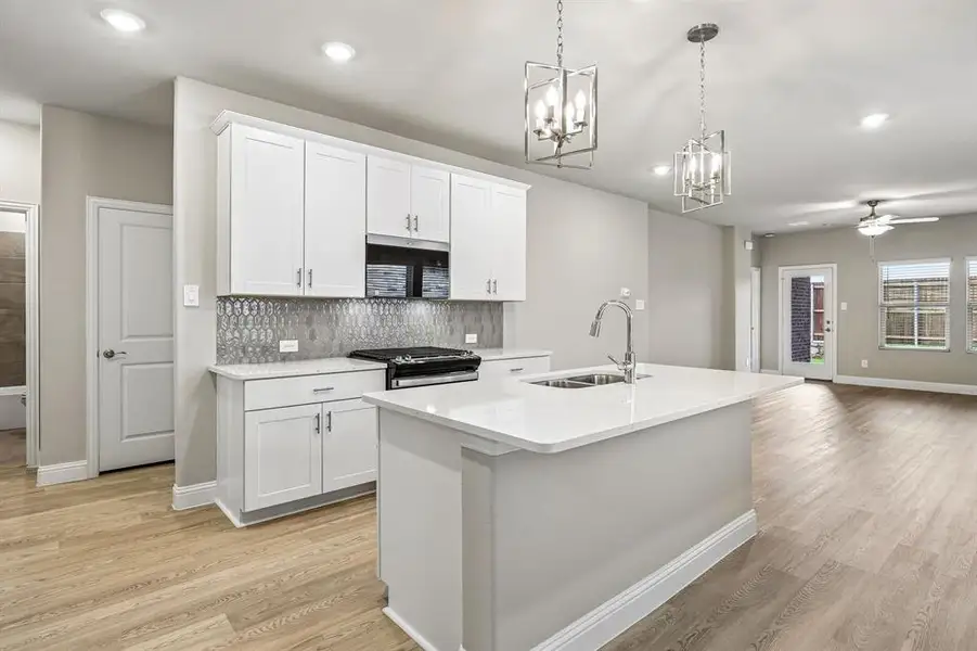 Furnished interior view inside a new home in Parks at Foster Crossing - Spring Series, Anna (Image 6).