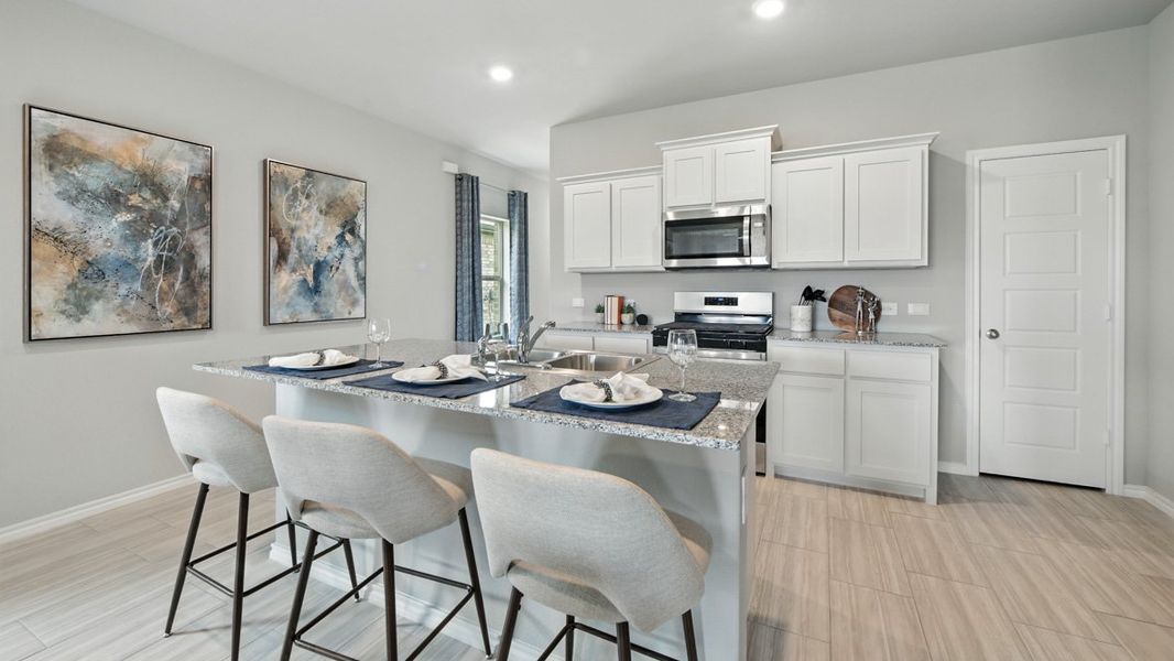 Furnished interior view inside a new home in Monarch at the Meadows, Ponder (Image 5).