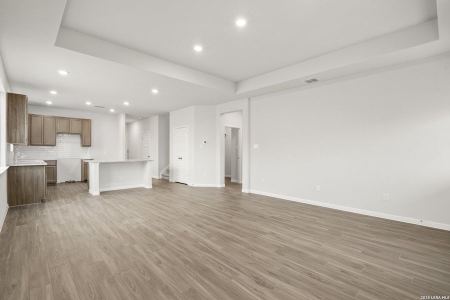 Spacious, unfurnished interior of a new home in Hunters Ranch, San Antonio (Image 14).