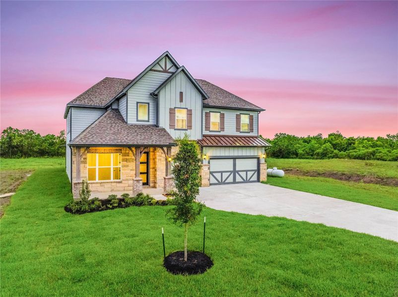 Front exterior of a new home in , Rosharon, TX, highlighting curb appeal (Image 2). Front exterior of a new home in , Rosharon, TX, highlighting curb appeal (Image 2).