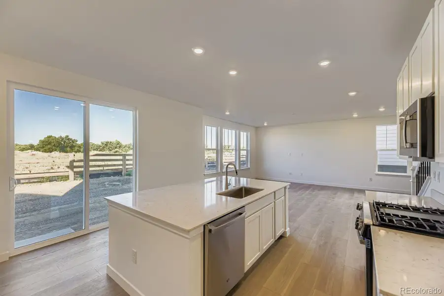 Furnished interior view inside a new home in Vermilion Creek: The Pioneer Collection, Centennial (Image 4).