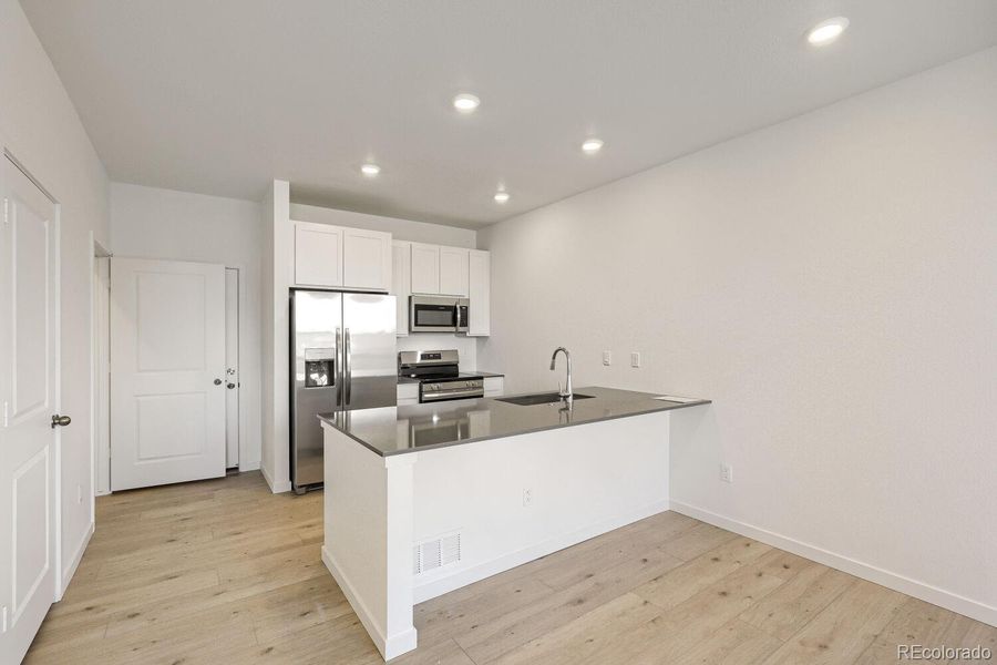 Furnished interior view inside a new home in Parterre, Thornton (Image 5).