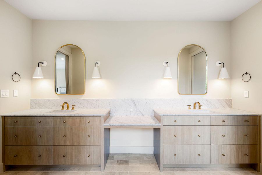 Bathroom featuring double vanity and two vanities Bathroom featuring double vanity and two vanities